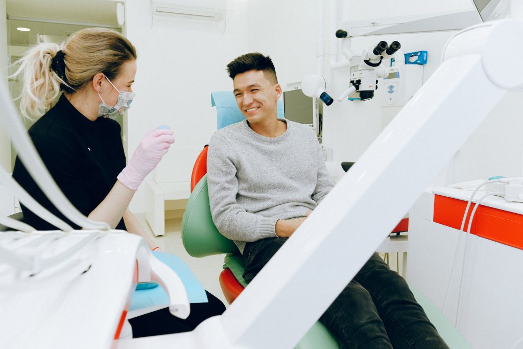 Young man at the dentist for dental crowns